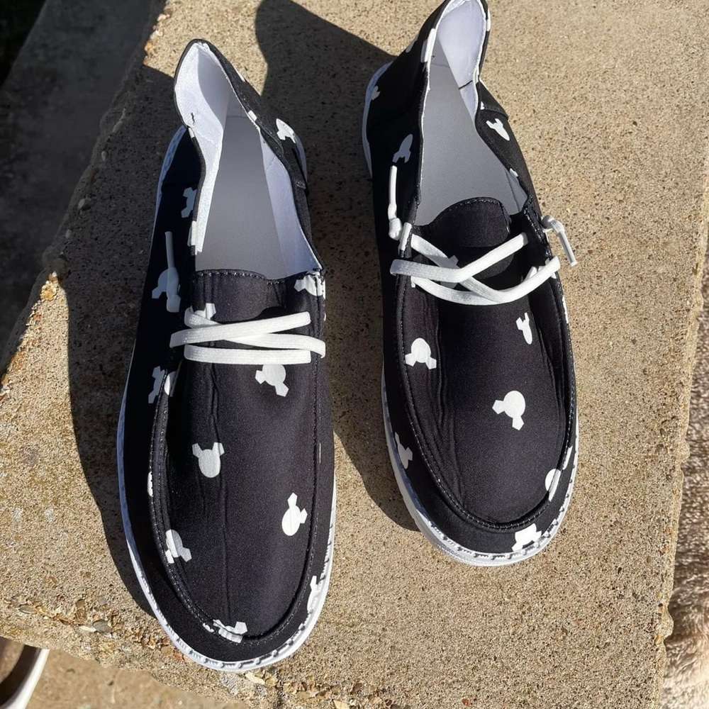 MICKEY MOUSE 
Knock off “Hey Dude” type shoe.